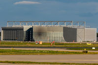  - A 380 maintenance building.
The dark spot is from a MD 11 engine test! - by Uwe Zinke