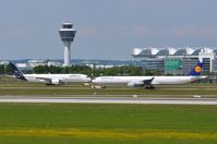  - Munchen Airport, tower and part of the terminal and runway in front of the taxyways. View from spotting mount. - by FerryPNL