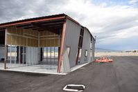  - Some thunder storm wind damage to a hangar being moved to a new location. - by Gerald Howard