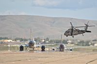  - UH-60A departs on Bravo after UPS & Fed Ex pass by headed for RWY 28L. - by Gerald Howard