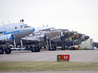  - DC3s and an Li-2 lined up at Duxford before flying off to Caen, France on the 5th of June.  - by moxy