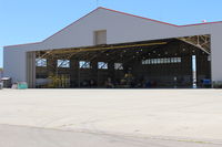  - Another view of the Ventura County Fire Department Helicopter Unit that has now taken over the entire hangar and added foreground ramp. Formerly just in west end & west ramp. Aircraft formerly on outside ramp relocated. - by Doug Robertson