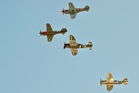  - P-40s and P-47s fly by at Nampa Air Show. - by Gerald Howard