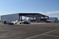  - Work on new hangar now has one side up. - by Gerald Howard