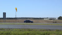  - Caboolture Airport YCAB viewed from Bruce Highway on 15Jul2019. - by Walnaus47