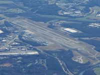  - From 10,000 feet MSL looking south. The FAA determined that the runway was too close to the taxiway. They built a whole new runway (west side), tore up the old runway and built a new one (in the center). This has been in process several years. - by Jim Monroe