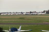  - North Side (left to right): SE-DSV, SE-DSU, SE-RJI, SE-DJN, VH-NUV, G-FBEG, G-LCYD, G-LCYV, G-LCAB, G-FBEH. - by Michael Pearce