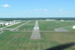  - Crystal airport, Minneapolis MN USA, short final Runway 32.  freshly painted runway stripes - by Timothy Aanerud