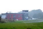  @ EDWS - Norden-Norddeich airfield buildings seen from a distance - by Ingo Warnecke