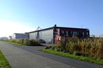  @ EDWS - Norden-Norddeich airfield hangars  - by Ingo Warnecke