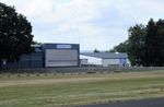  @ Dahlemer Binz Airport - view across the airfield of eastern buildings and hangars at Dahlemer Binz airfield - by Ingo Warnecke