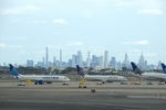  - View from the United Airlines terminal with Manhattan in the background - by Van Propeller