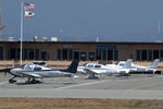  - Cirrus line up at San Carlos airport, CA - by Van Propeller