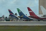  - Colorful line-up of B767 freighters at MIA cargo - by FerryPNL