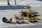  - empty baggage train and loading vehicle at Wien airport #v - by Ingo Warnecke