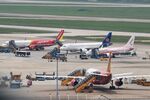  - Planes being handled on the tarmac in SGN - by FerryPNL