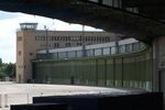  - western buildings / hangars seen from the covered boarding area of the terminal of the former Tempelhof airport - by Ingo Warnecke