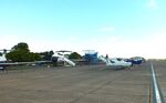  - parked aircraft on apron and museum airliners at Duxford airfield - by Ingo Warnecke