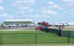 - parked aircraft on apron and museum hangars at Duxford airfield - by Ingo Warnecke