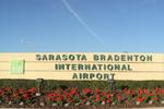  - Entrance sign to Sarasota-Bradenton International Airport - by DontenPhotography