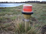  - One of the red lights at the pre-threshold area of Runway 28 at the closed Vaerloese Air Base in Denmark. The lights were removed some months later. - by Jan Lundsteen-Jensen