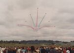  - RAF Red Arrows performing the Vixen Break at Vaerloese Air Base Open House 1994 in Denmark. In the background 2 spare Red Arrows Hawks and 4 C-130s. - by Jan Lundsteen-Jensen