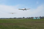  - Piper Pawnee OY-CYP as tow plane for Grunau Baby OY-AXE. Planes seen shortly after takeoff from a temporary grass runway at an airshow at the former Vaerloese Air Base in Denmark. - by Jan Lundsteen-Jensen