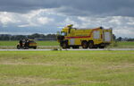  - Behind the fire chief car is fire truck RO 07 from Copenhagen-Roskilde Airport on standby at an airshow at the former Vaerloese Air Base in Denmark. - by Jan Lundsteen-Jensen