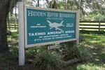  - Entrance sign for Hidden River Airport  - by Suncoast Spotter