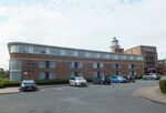  - landside view of the old 1930s terminal and tower (today a Crowne Plaza hotel) with exhibition of vehicles and aircraft preserved by the Speke Aerodrome Heritage Groups (SAHG) on the former apron  - by Ingo Warnecke