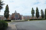  - landside view of the old 1930s terminal and tower (today a Crowne Plaza hotel) with exhibition of vehicles and aircraft preserved by the Speke Aerodrome Heritage Groups (SAHG) on the former apron  - by Ingo Warnecke