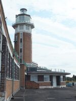  - airside view of the old 1930s terminal and tower (today a Crowne Plaza hotel) with exhibition of vehicles and aircraft preserved by the Speke Aerodrome Heritage Groups (SAHG) on the former apron - by Ingo Warnecke