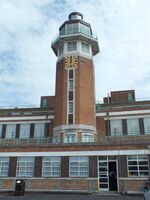  - airside view of the old 1930s tower (today a Crowne Plaza hotel) with exhibition of vehicles and aircraft preserved by the Speke Aerodrome Heritage Groups (SAHG) on the former apron - by Ingo Warnecke