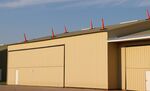  @ Albertus Airport - Traffic cones on top of a hangar in Freeport, IL - by Mark Pasqualino