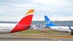 Adolfo Suárez Madrid–Barajas Airport, Iberia A321-200 and Air Europa B737-800 tail to tail, photo by luckytravel
