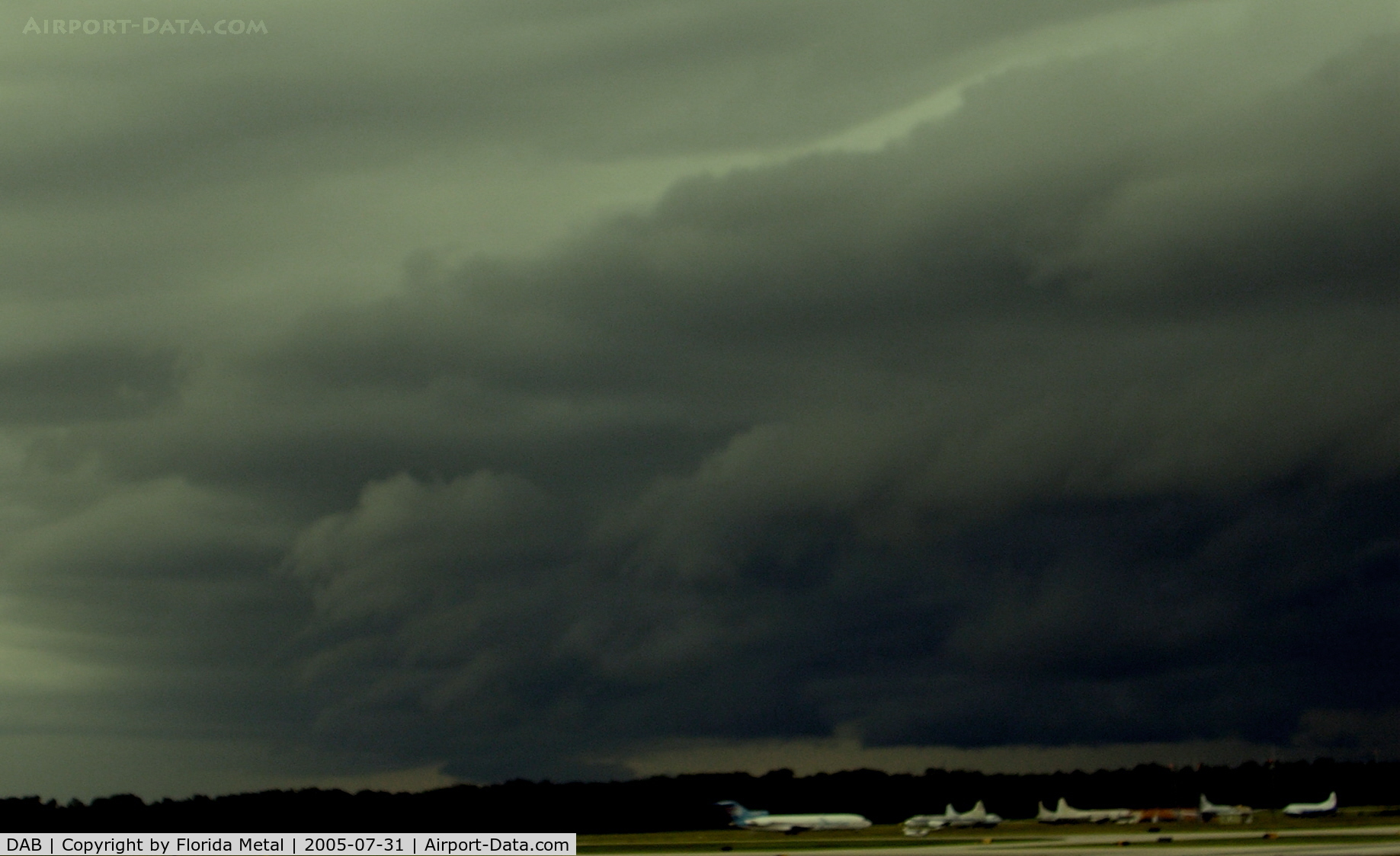 Daytona Beach International Airport (DAB) - Looking Southwest over the airfield at a nasty summer storm