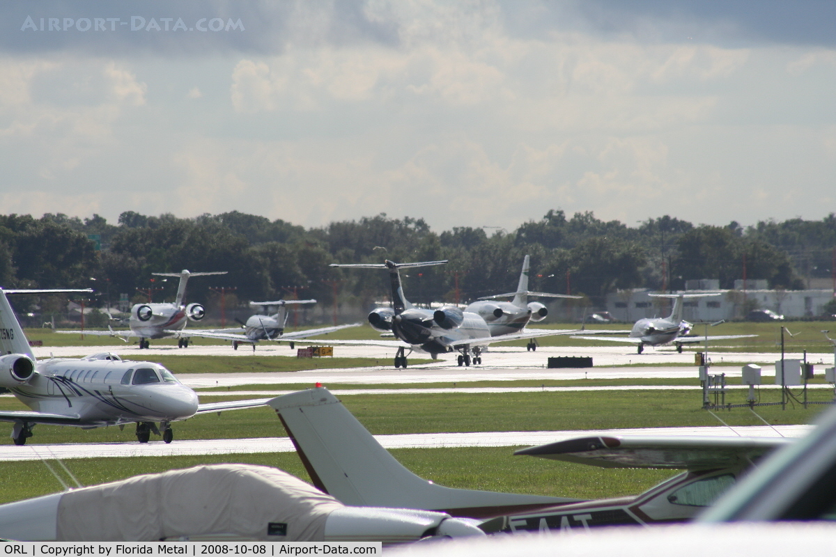 Executive Airport (ORL) - Line up of departing aircraft on NBAA last day