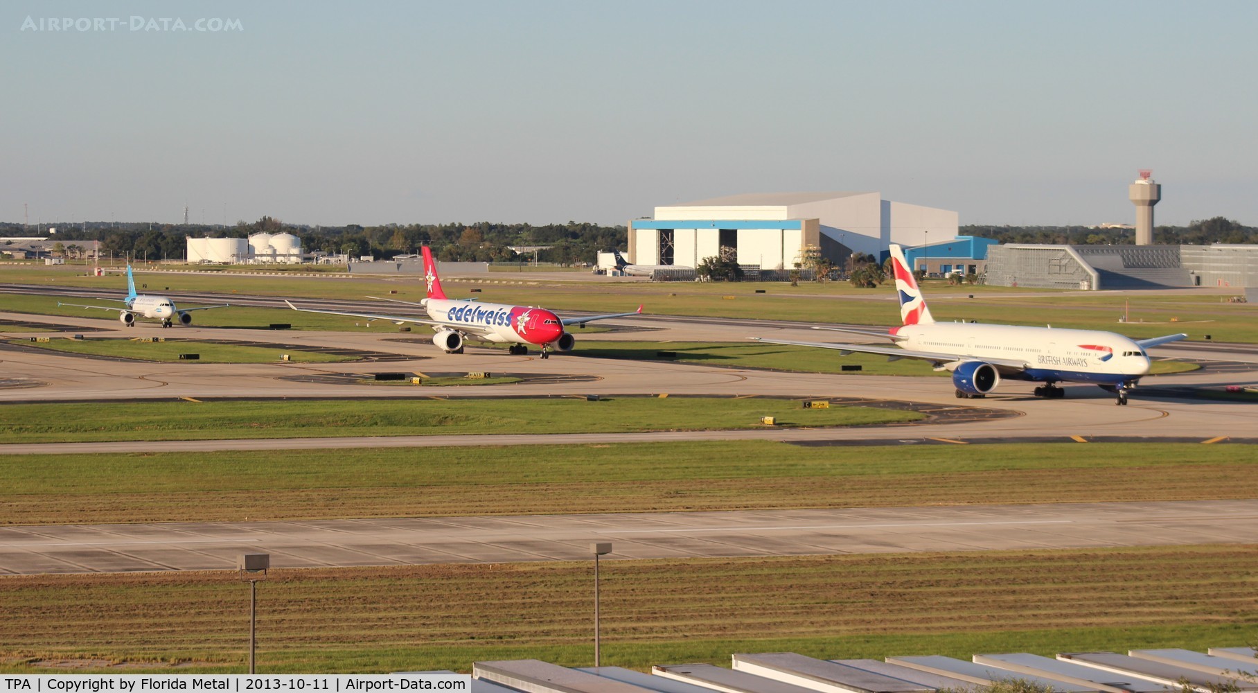 Tampa International Airport (TPA) - Line up of British Airways, Edelweiss and USAirways Carolina Panthers