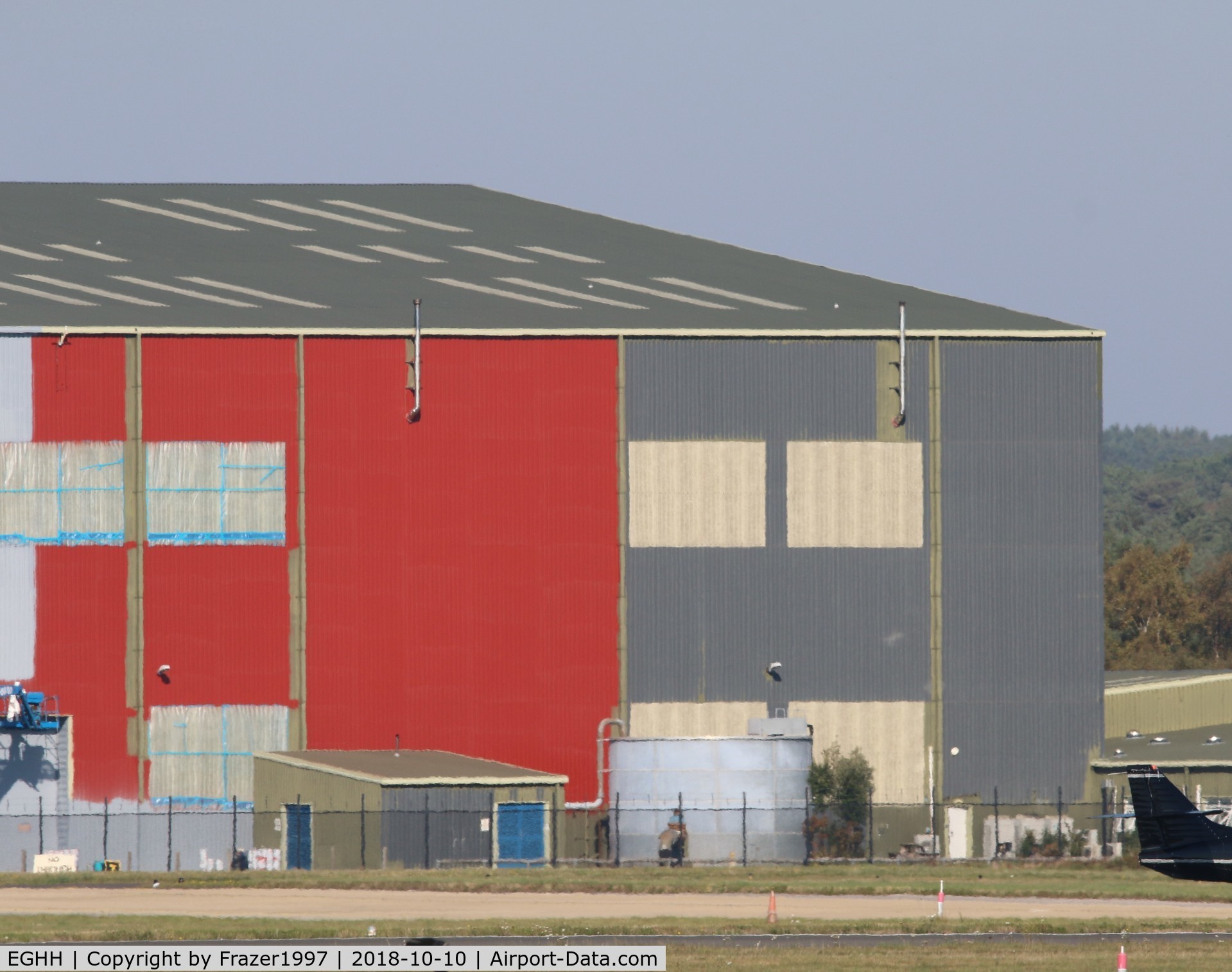 Bournemouth Airport, Bournemouth, England United Kingdom (EGHH) - The Large hanger at Bournemouth previously used to store the 747'8 BBJVQ-BSK being painted for the new owners GAMA Aviation. 