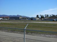 Oxnard Airport (oxr) - OXR Runway 07-25, 5,953' X 100' asphalt, Million Air Hangar Southeast end. OXR was a Civilian Pilot Training Program field from 1939 onward thru World War II. Mira Loma Academy pilot housing across Fifth Street south of field now low-cost rental housing. - by Doug Robertson