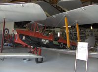 Santa Paula Airport (SZP) - Aviation Museum of Santa Paula, Hangar 2, The Watson hangar, 1944 D.H.82-A Tiger Moth, see N675LF for more data - by Doug Robertson