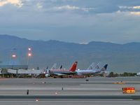 Harry Reid International Airport (LAS) - Ok everybody, gather 'round & listen up...here's the plan for the day. - by Brad Campbell
