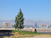 Harry Reid International Airport (las) - Looking towards McCarran, The Strip and Spring Mountains beyond from 'Park 2000' east of the runway. - by Brad Campbell