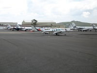 Napa County Airport (APC) - Bridgeford A/S ramp on a rainy Sunday in the rainiest spring in Northern California ever! - by Steve Nation