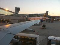 Philadelphia International Airport (PHL) - Here is the control tower and main terminal, as seen from an Air Jamaica A320 at dawn. - by Daniel L. Berek