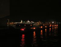 Penn's Landing Heliport (P72) - Penn's Landing hosts sight-seeing helicopters by day and television and police choppers by night. Across the Delaware is the battleship USS New Jersey. - by Daniel L. Berek