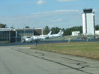 Piedmont Triad International Airport (gso) - Landmark Aviation and the control tower - by Sam Andrews
