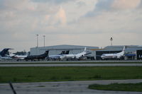 Daytona Beach International Airport (DAB) - Several turboprops for the race in front of Sheltair Hangars - by Florida Metal
