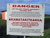 Rarotonga International Airport - Sign at Rarotonga airport, where the final flightpath is across the water, over a small street, and right onto the runway - almost like St Maarten... - by Micha Lueck