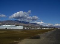 Santa Paula Airport (SZP) - Newer & Old Hangars, Santa Paula Peak in background. Elevation: 4,917 ft. - by Doug Robertson